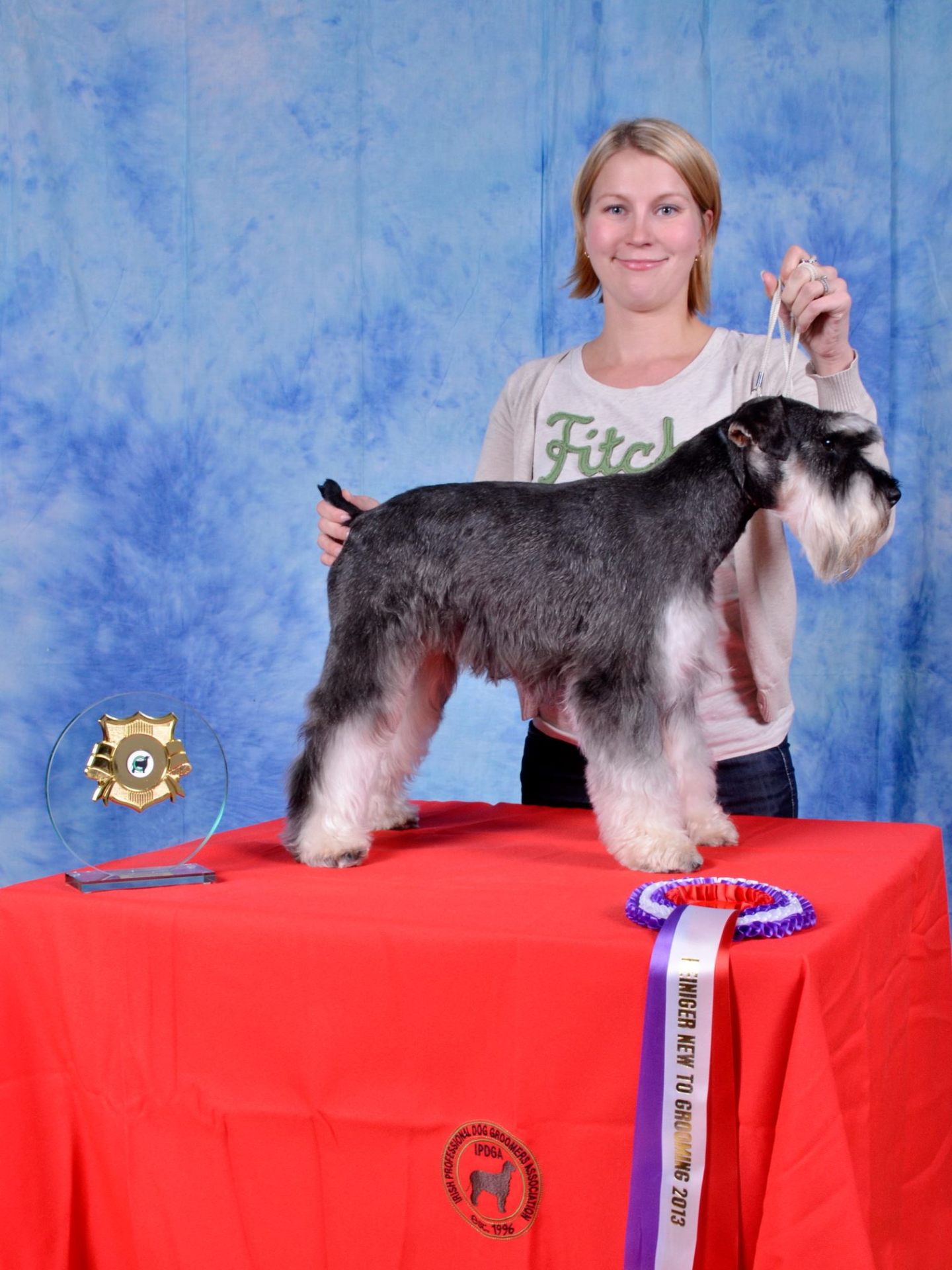 Johanna of Holywood Hounds with an award-winning schnauzer groom